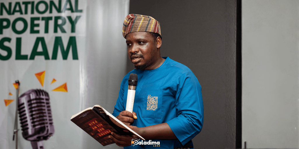 "Adetimilehin ‘Vic’Adex’ Inioluwa Victor reading poetry at the National Poetry Slam, highlighting his emotional and cultural voice."