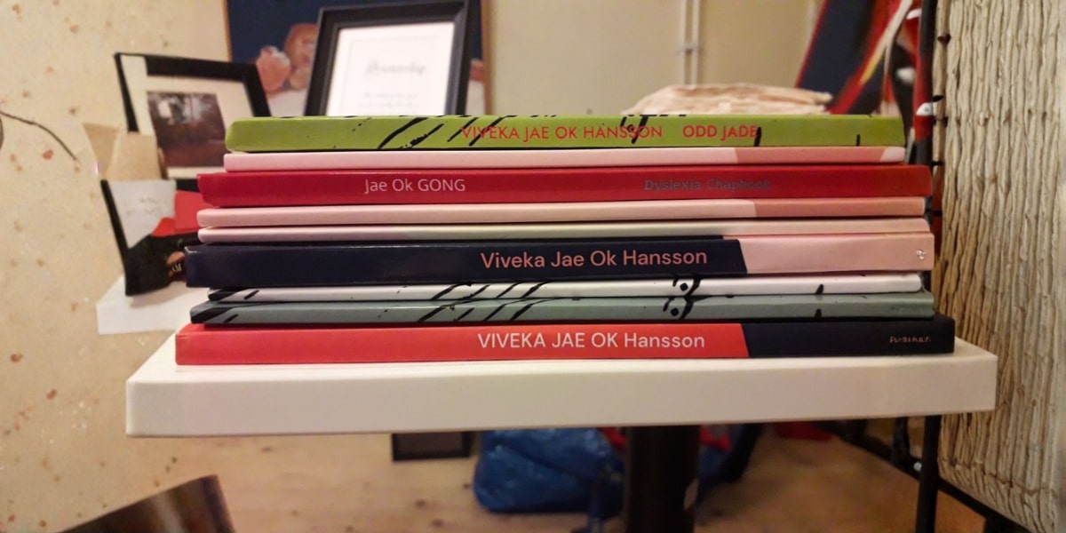 Books by Viveka Jae Ok Hansson, including titles like 'Odd Jade' and 'Jae Ok Gong,' reflecting her creative journey.