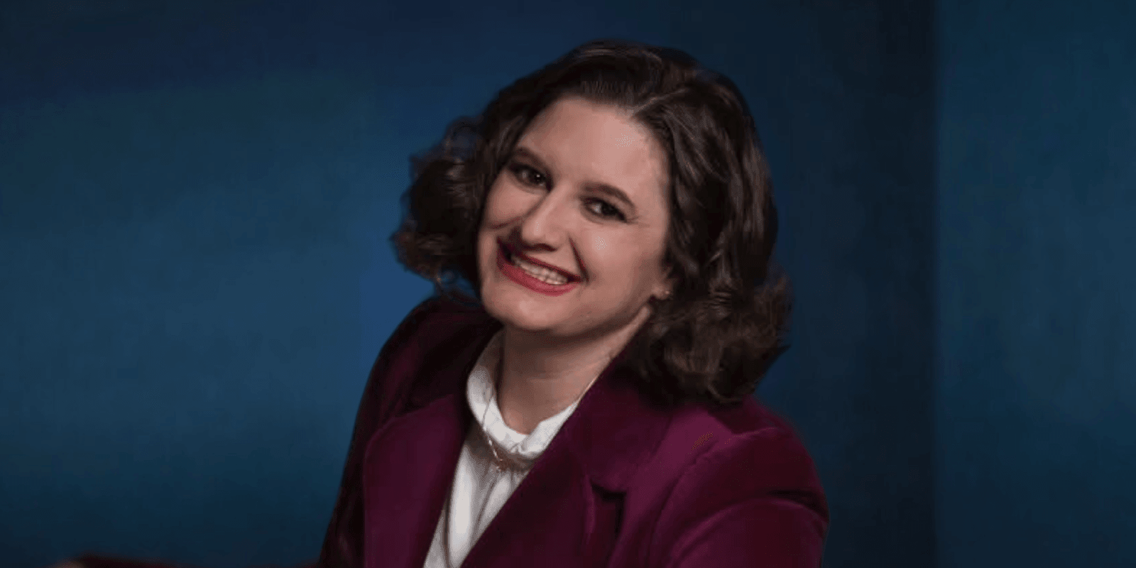 Sherri Fulmer Moorer, award-winning author and founder of Broken Reality Books, reshaping science fiction with empowering narratives for women.